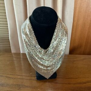 Silver mesh cowl neck necklace.